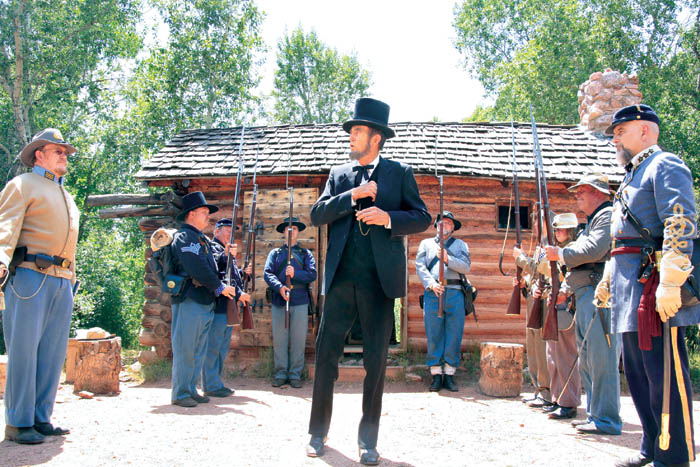 Abraham Lincoln (portrayed by Merell Folsom) delivers the Gettysburg Address at Rock Ledge Ranchs Galloway Cabin 
during its Family Fourth.
Westside Pioneer photo