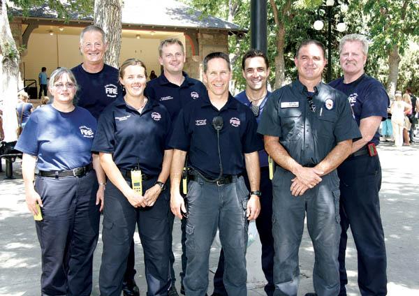 Scenes from the Westside Neighbors Picnic... Members of
Fire Stations 3 and 5, who attended the picnic, combine for
a rare joint photo. From left are Doreen Schmidt (3),
Howard Henderson (3), Bekkah Wisham (5), Jon Messersmith (5), Carl Miller (5), Brian King (3), Mike Foos (5) and Larry Schwarz (3).
Westside Pioneer photo