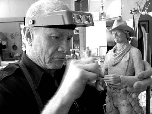 Michael Garman sculpts one of his many characters.
Courtesy of Michael Garman Productions