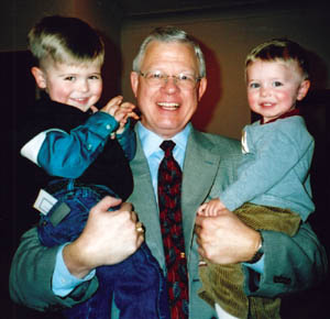 Pastor Rick Carpenter has a handful with longtime member 
Dixie Fields great -grandsons Kale (left) and Cash. 
Courtesy of Pikes Peak United Methodist Church