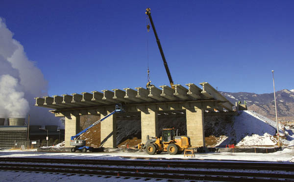 The new Cimarron bridge over Conejos Street and the railroad tracks has begun taking shape, as new concrete 
girders have been installed.
Westside Pioneer photo