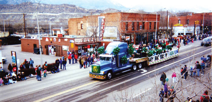 A semi pulls a trailer with the Blooms and Rogers Bar
float/band down the 2500 block of Colorado Avenue during
one of the early St. Patricks Day parades. The truck used
to circle back to Rogers Bar (located below this photos
vantage point) after the parade and play while people
danced in the street.
Courtesy of the Bloom family