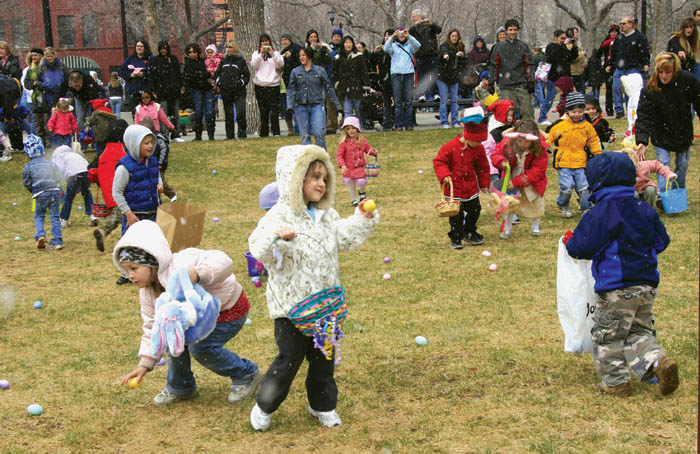 Egg Hunt scenes in Bancroft Park (from top left)... A youngster treasures the egg she�s found.
Westside Pioneer photo