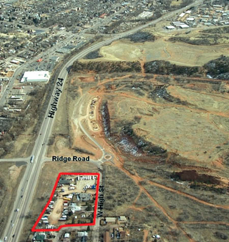 An aerial view shows the property to be auctioned April 18. Photo looks east. Ridge Road becomes High Street where 
the road makes a 90-degree turn to the west, just past the entrance to Red Rock Canyon Open Space. The open-space parking lot can be seen east of Ridge Road.
Courtesy of Tranzon Asset Advisors
