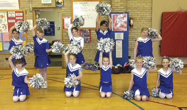 The E-Gals spell C-S-A-P. From left: (back row) Lauren Dehart, Karissa Russell, Cara Milton, Zeriah Trujillo, Jamie 
Ratzlaff; (front row) Rowan Freeway, Chelsea Bowes, Kristina Gibson, Illaya Monroe, Athena Givens. Not pictured: Stephanie Martinez, Madison Taylor. 
Westside Pioneer photo