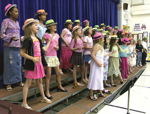 A combined choir from Howbert and Pike elementaries belted out the tune, Play That Music, during Howberts 
second annual Spring Festival of the Arts April 27. 
Westside Pioneer photo