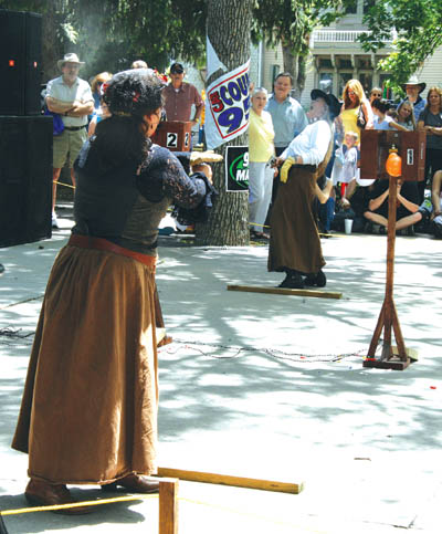 Jackie Matz (foreground) �guns down� a surprisingly affable
opponent during qualifying rounds of the 2007 Territory Days Fast Draw competition. New last year, the event will return at this year�s festival.
Westside Pioneer photo