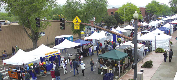 A view looking west from the Goodwill building roof shows people braving the cold May 30. This was the first year the 
2300 block has been added to Territory Days.