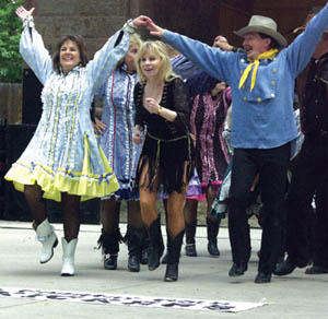 Sidekickers dancers near the finale of their Gold Rush number in Bancroft Park