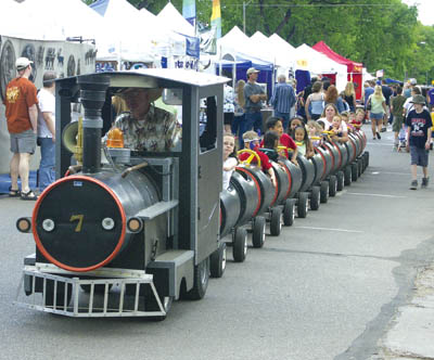 The childrens choo-choo train rumbles along the 2300 block