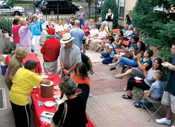 While Old Colorado City Historical Society volunteers scoop out ice cream, a Sweet Adelines quartet performs during 
the society�s 'Old Fashioned Ice Cream Social' July 1 at the History Center.
Westside Pioneer photo