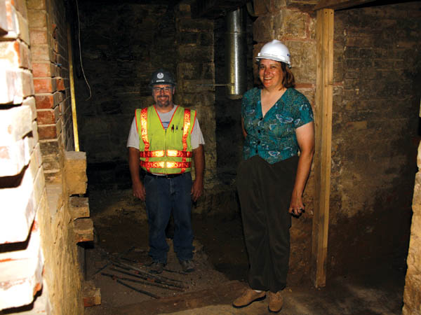 Branch Manager Julianne Rist and project foreman Dale Geist in the formerly sealed-off vault area. 
Westside Pioneer photo