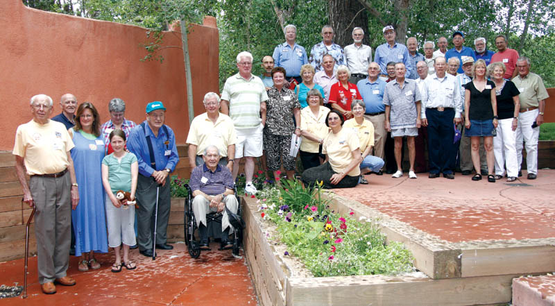 Attendees at the annual Pikes Peak Hill Climb�s �Over the Hill Gang� reunion � many of them former racers � posed 
outside for a group photo July 18. 
Westside Pioneer photo