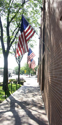 The American flag display outside Pikes Peak National Bank encroaches on the right of way, according to City Planning.
Westside Pioneer photo