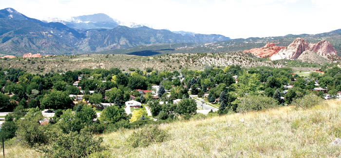 One of the prime views � taking in both the Garden of the  Gods (far right) and Red Rock Canyon (far left) � that 
will be seen from houses built along the ridge above the Pleasant Valley neighborhood (lower foreground).
Westside Pioneer photo