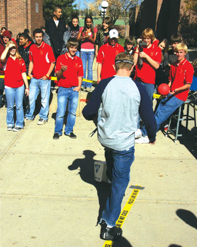 While some of the Coronado student organizers watch, a
student wearing the drunk goggles stumbles into an
unseen box on an obstacle course as part of a Drive Smart exercise last week to show how alcholo can impair a drivers senses.
Westside Pioneer photo