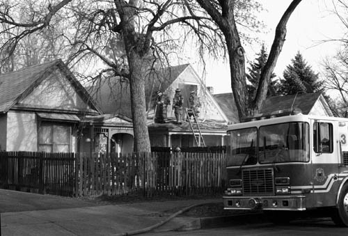 Crews from the Westside�s Fire Stations 3 and 5 helped
keep the fire at 1726 W. Colorado Ave. from spreading to
the houses on either side Dec. 7. The cause of the
$140,000 blaze is under investigation.
Westside Pioneer photo