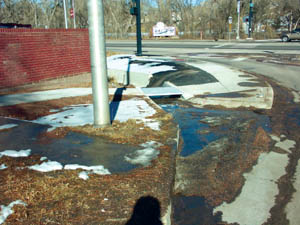 The finished product, including the sidewalks metal-plate 
bridge over the gutter drainage where it flows into an adjacent ditch.
Westside Pioneer photo